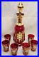Antique-Vintage-Ruby-Red-3D-Italian-Murano-Decanter-set-with-6-shot-glasses-01-jmqg