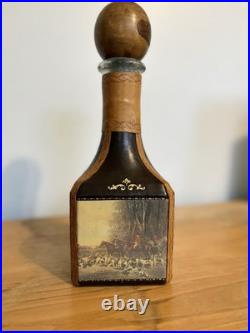 Fausto Conturi Vintage Italian leather-wrapped decanter with embossed scenes