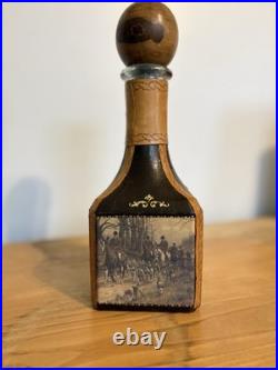 Fausto Conturi Vintage Italian leather-wrapped decanter with embossed scenes