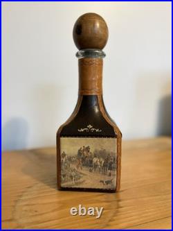 Fausto Conturi Vintage Italian leather-wrapped decanter with embossed scenes