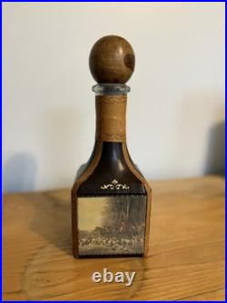 Fausto Conturi Vintage Italian leather-wrapped decanter with embossed scenes