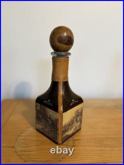 Fausto Conturi Vintage Italian leather-wrapped decanter with embossed scenes