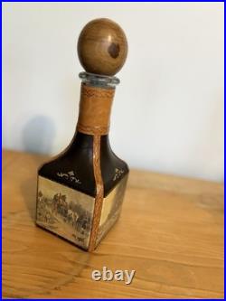 Fausto Conturi Vintage Italian leather-wrapped decanter with embossed scenes