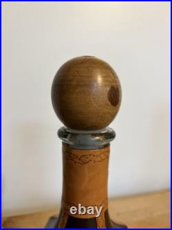 Fausto Conturi Vintage Italian leather-wrapped decanter with embossed scenes