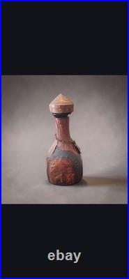 Jeype vintage Spanish glass decanter wrapped in embossed, tooled leather Bottle
