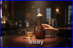 Jeype vintage Spanish glass decanter wrapped in embossed, tooled leather Bottle