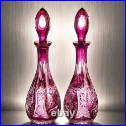 Pair of 14 vintage Nachtmann Cranberry cut to clear Crystal decanters STUNNING