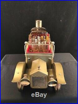 The Solid Gold Cadillac Musical Liquor Decanter And Glasses Set Vintage