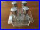 Vintage-Bar-Ware-Decanter-Set-of-Four-in-Lucite-Swivel-Case-and-Chrome-Lids-USA-01-izw