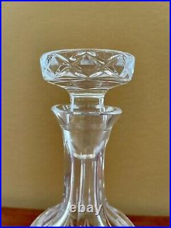 Vintage Decanter set with 4 glasses. Heavy weight clear cut crystal. Great gift