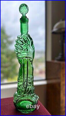 Vintage Glass Bottle. Prunelle Garnier. Hand with Dagger Decanter Bottle