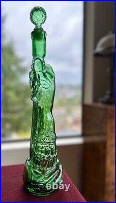 Vintage Glass Bottle. Prunelle Garnier. Hand with Dagger Decanter Bottle