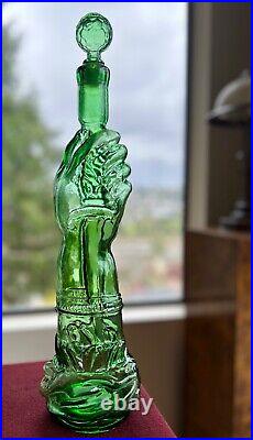 Vintage Glass Bottle. Prunelle Garnier. Hand with Dagger Decanter Bottle