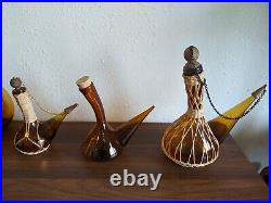 Vintage MCM 1960s Glass Amber Handblown Rattan Spanish Porron Decanters. Set (3)
