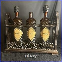 Vintage MidCentury Spanish Gothic Brutalist Amber Glass Decanter Trio Wood