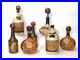 Vintage-Noymez-Leather-Covered-Glass-Bottle-Decanter-Made-in-Italy-SET-of-7-NEW-01-pq