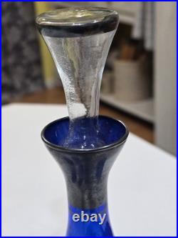 Vintage cobalt blue glass decanter and six glasses with silver overlay