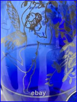 Vintage cobalt blue glass decanter and six glasses with silver overlay