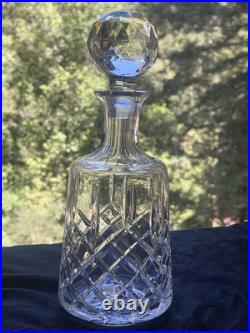 Vintage crystal decanter criss-cross cut design With matching faceted stopper