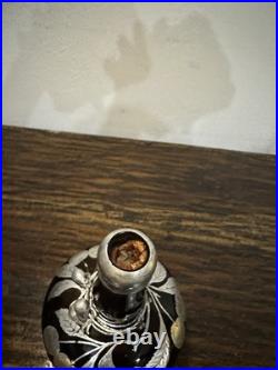 Vintage or antique silver overlay glass decanter or bottle