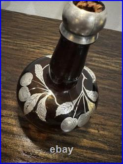 Vintage or antique silver overlay glass decanter or bottle