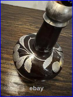 Vintage or antique silver overlay glass decanter or bottle