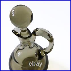 Vintage solid smoked colored glass decanter with handle and original lid