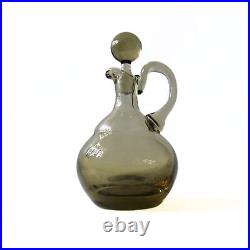 Vintage solid smoked colored glass decanter with handle and original lid