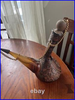 Vintage tooled leatherd covered glass decanter